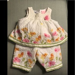 Pastel Watercolor Flowers Grace this Baby Outfit